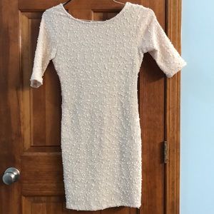 Cream sweater dress with scoop back